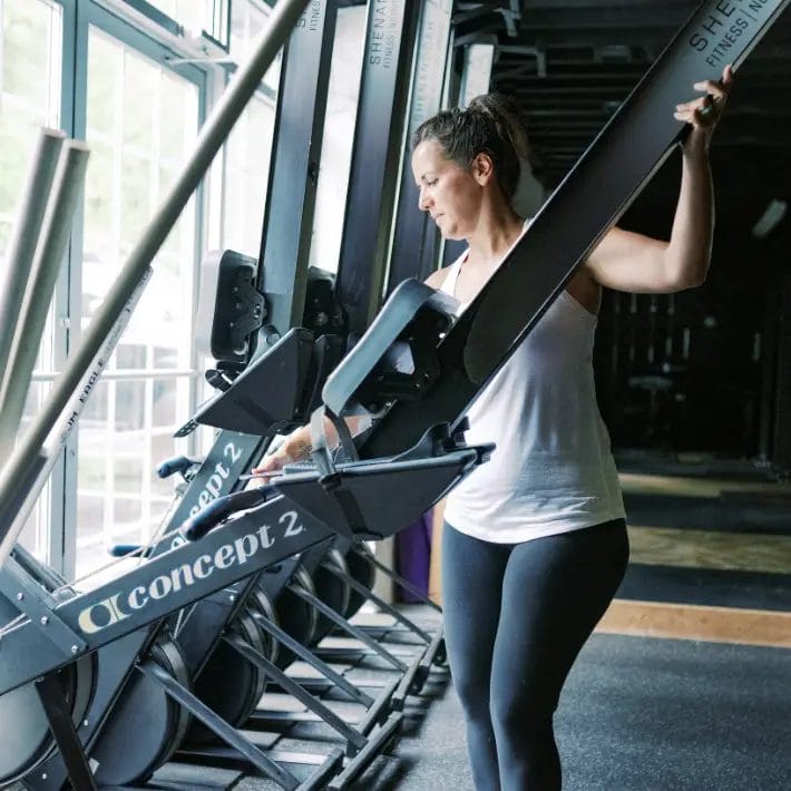 Coach setting up machine