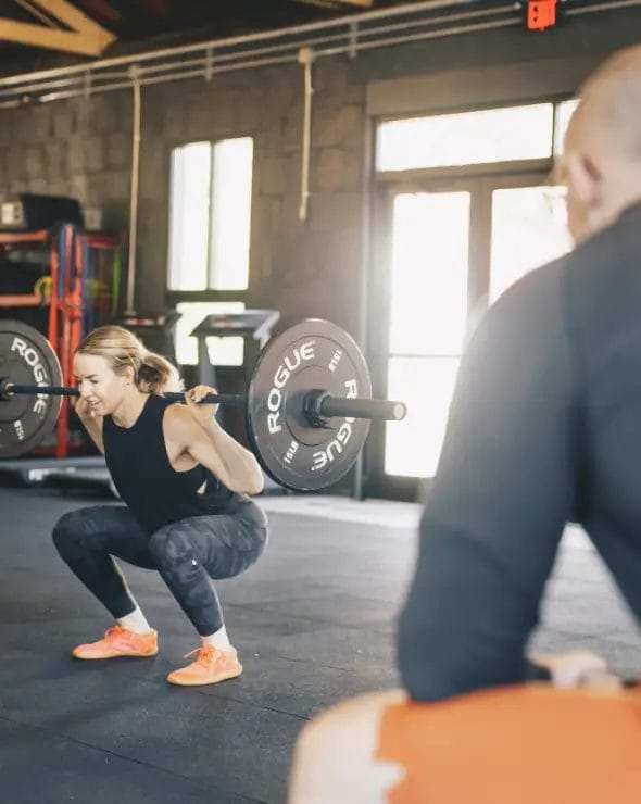 Lifting weights while coach is looking